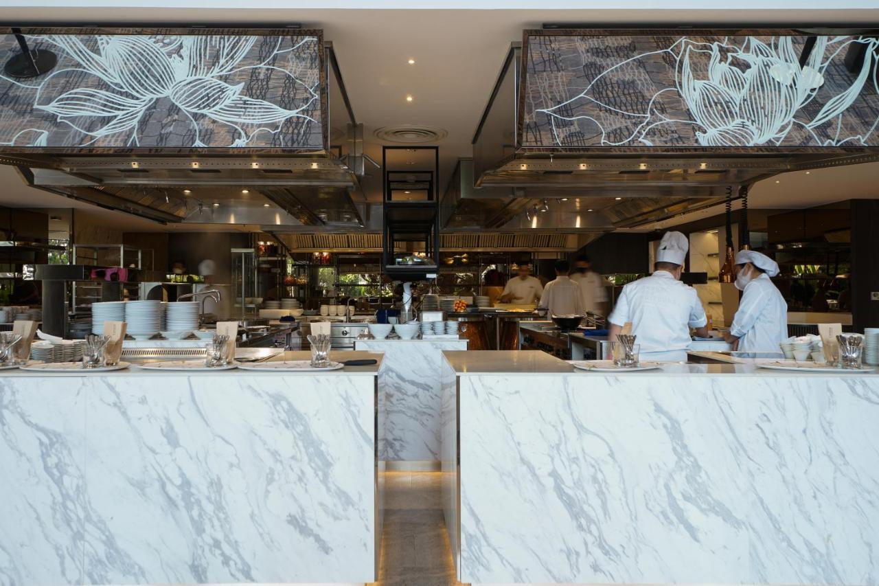 Chatrium Grand Bangkok Exterior photo The kitchen at the restaurant